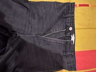 Vaqueros pitillo tiro alto negros