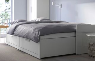 Diván/cama blanco con 2 cajones