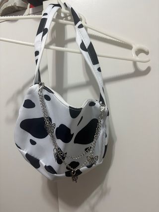 Bolso estampado vaca con cadena