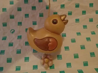 Addobbo pulcino con fiore a campana Pasqua thun