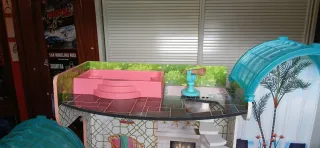 Casa de muñecas de madera