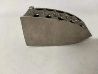 Plancha antigua metálica