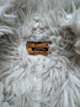 Gabardina beige con cuello de pelo