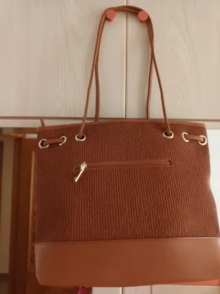 Bolso marrón sin estrenar. No acepto regateos.