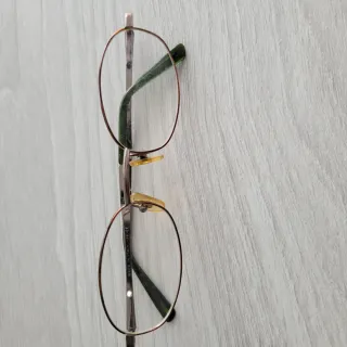 Montura gafas metal doradas con detalles verdes