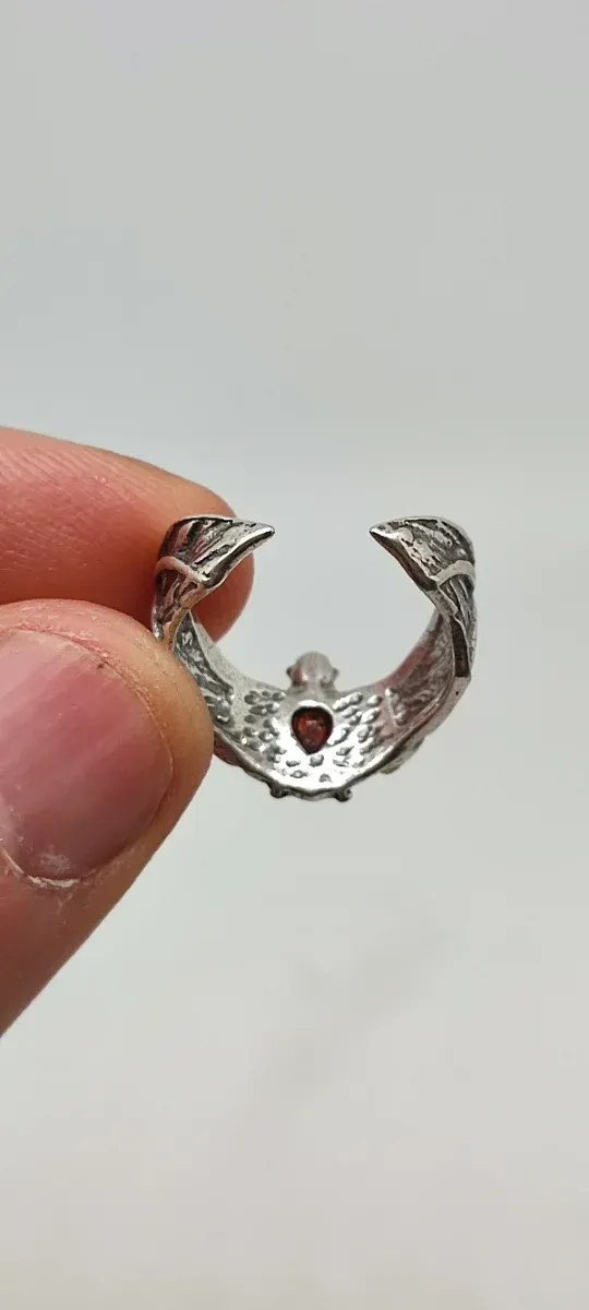 Anillo de plata ajustable y ámbar.