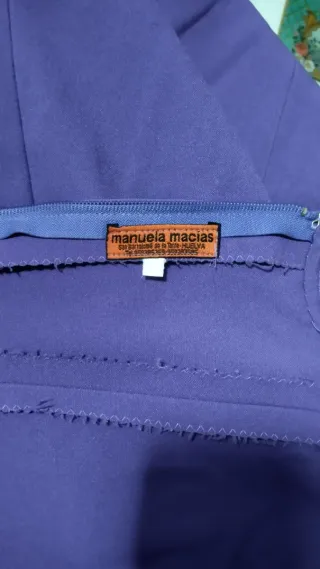 Traje de flamenca morado y multicolor