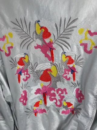 Cazadora polipiel Sfera bordada