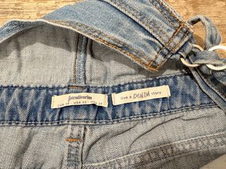 Mono tejano corto desgastado