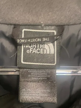 Cortavientos The North Face gris y negro