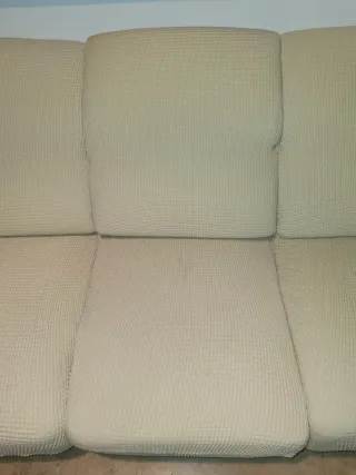 Sofá de piel blanco y marrón