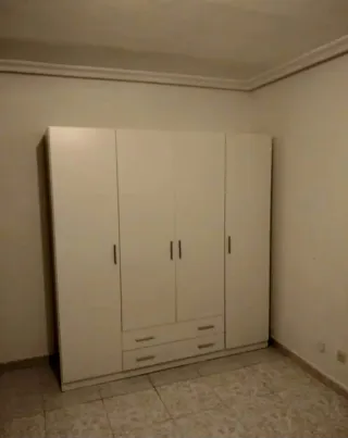 Armario blanco 6 puertas y 4 cajones