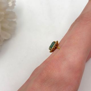 Anillo oro 18kt con esmeralda y circonitas
