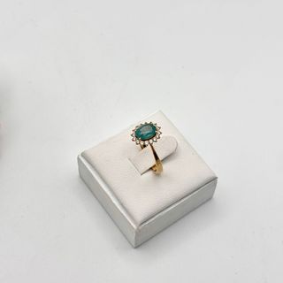 Anillo oro 18kt con esmeralda y circonitas
