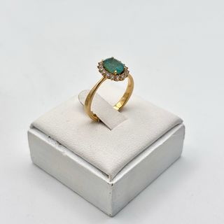 Anillo oro 18kt con esmeralda y circonitas