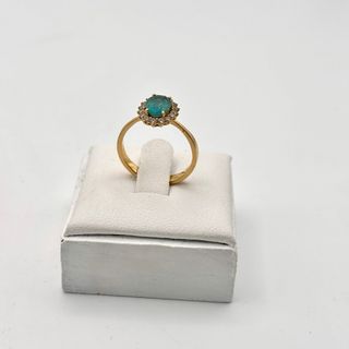 Anillo oro 18kt con esmeralda y circonitas