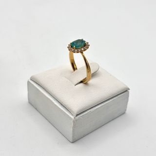 Anillo oro 18kt con esmeralda y circonitas