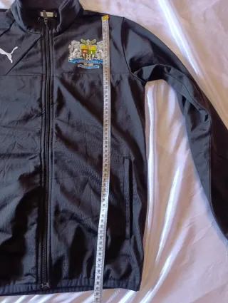 Chaqueta deportiva Puma negra talla ver fotos.