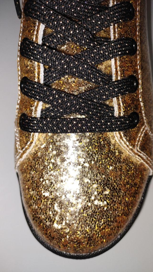 Zapatillas doradas Disneyland París