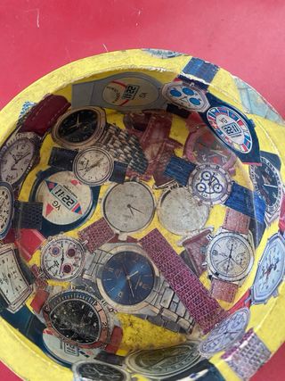 Svuotatasche decorato con orologi