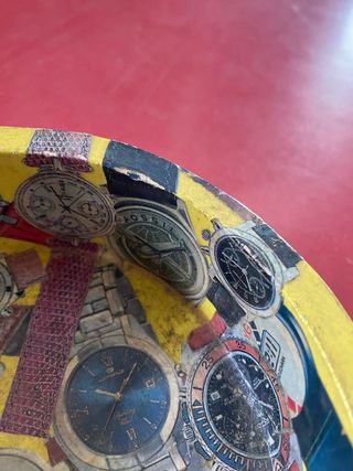 Svuotatasche decorato con orologi