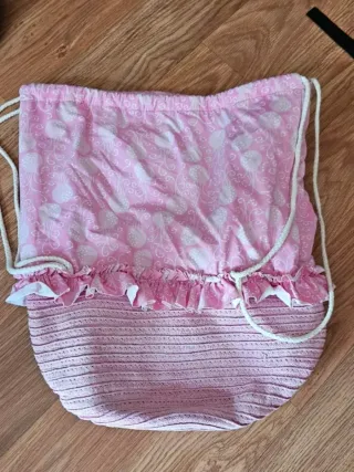 Mochila de cuerdas rosa con volantes