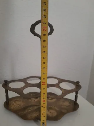 Antica canna da pesca con sei bicchieri