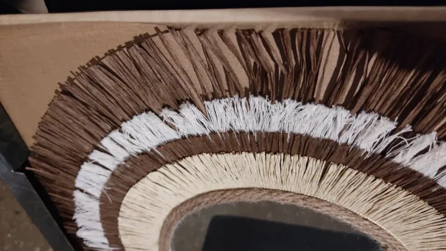 Espejo decorativo redondo con flecos