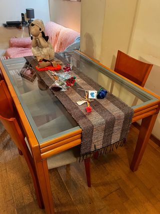 Mesa de comedor de cristal y madera