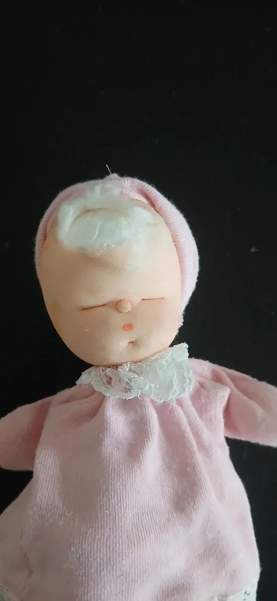 Muñeca antigua musical bebé