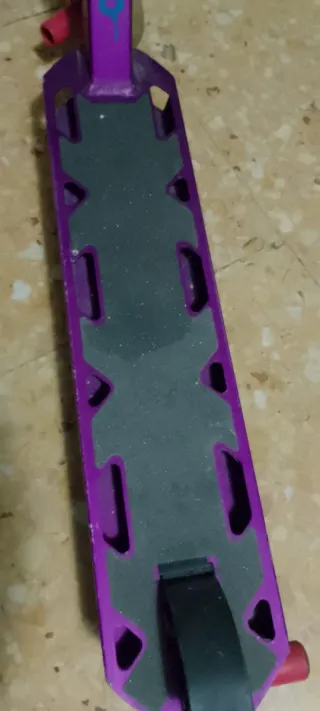 Patinete freestyle morado y negro