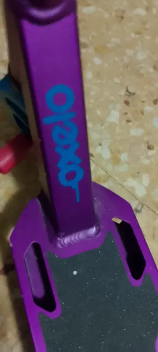 Patinete freestyle morado y negro