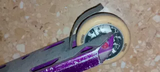 Patinete freestyle morado y negro