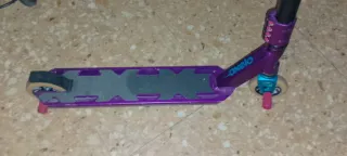 Patinete freestyle morado y negro