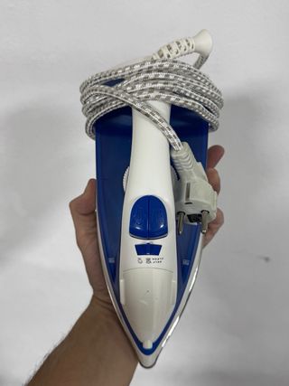 Plancha de ropa como nueva