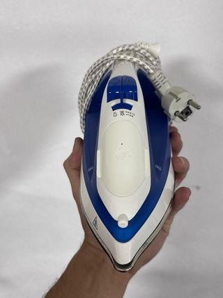 Plancha de ropa como nueva