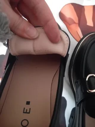 Mocassini Zoe neri con fibbia oro n°37