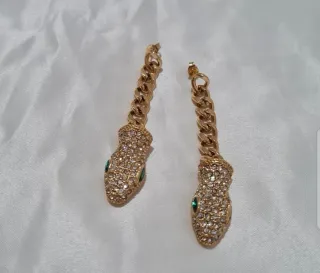 Orecchini serpente oro con zirconi