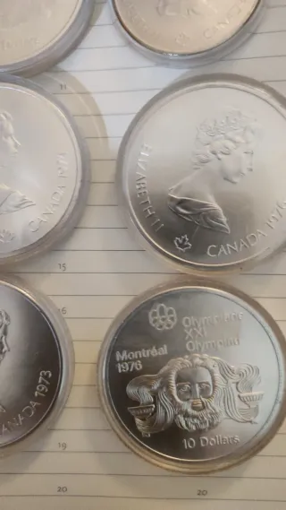 Confezione di monete d'argento equivalente a 8 once di Montreal 1976
