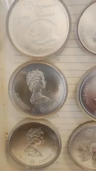 Confezione di monete d'argento equivalente a 8 once di Montreal 1976