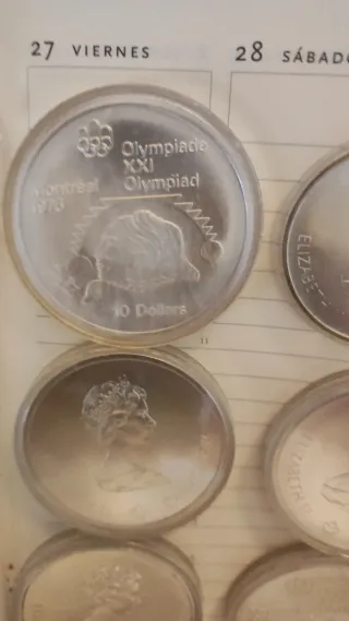 Confezione di monete d'argento equivalente a 8 once di Montreal 1976