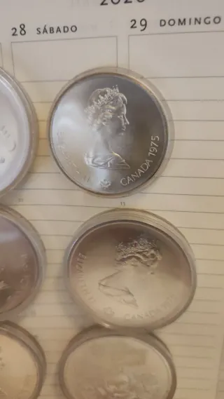 Confezione di monete d'argento equivalente a 8 once di Montreal 1976