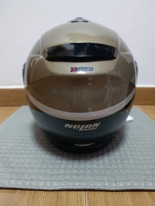 Casco modular carbono Nolan X-1005 fabricación2026
