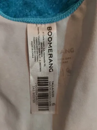 Bañador  de natación talla 6 y gorro natación niña