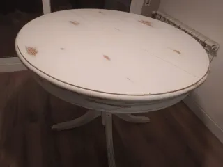 Mesa redonda extensible de madera blanca
