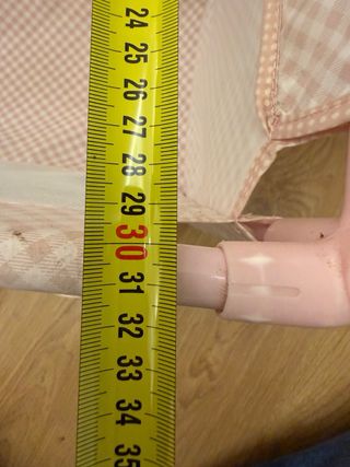 Cuna de tela y metal rosa