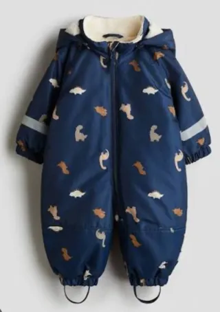 Buzo impermeable para bebé con dinosaurios