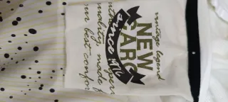 Camiseta con capucha New Caro