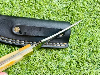 Cuchillo artesanal con funda de cuero