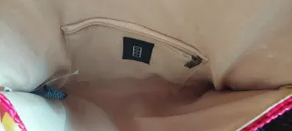 Bolso plano de rafia fucsia frambuesa